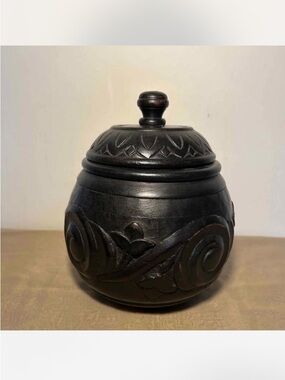 Wood carved canister